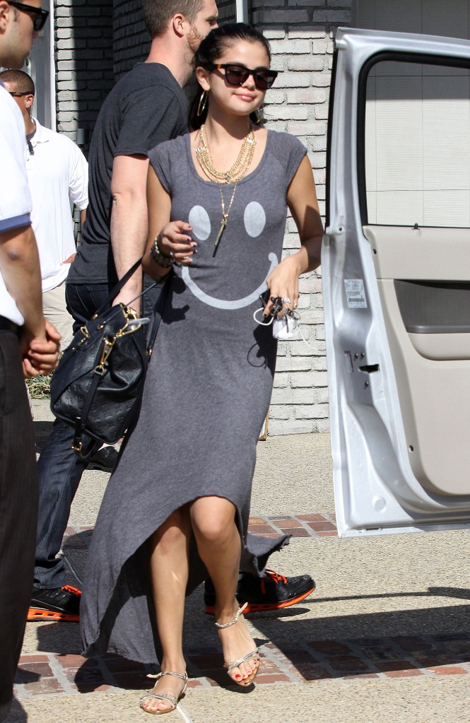 Selena Gomez - In a long dress Getting into her car in Malibu